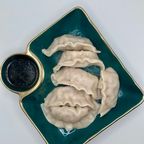 Best 11. Steamed or Fried Pork Dumplings (6) in Baltimore, MD