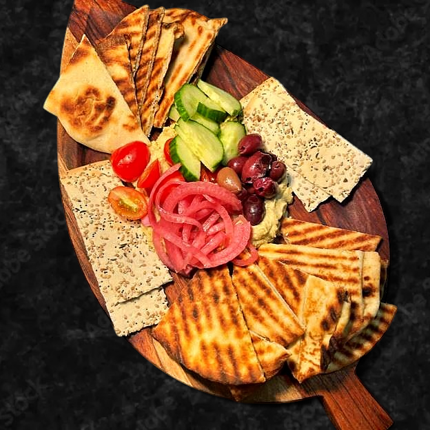 Best Loaded Hummus with Kalamata olives, tomato, cucumber and house made pickled onion in Johnson City, TN