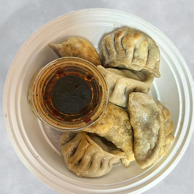 Best Pork Dumplings (8) Fried or Steamed in Cambria Heights, NY